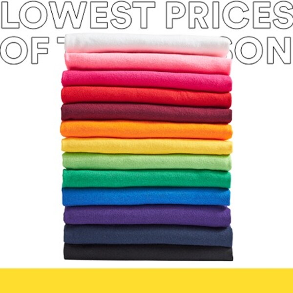 folded t-shirts stacked in rainbow order